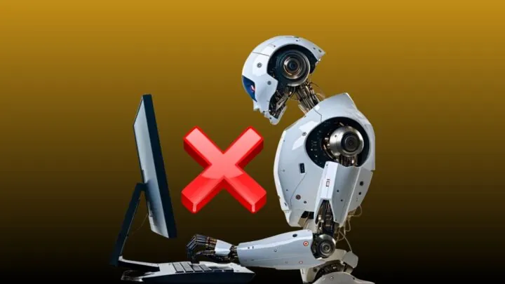 Roboter vor Computer mit rotem Kreuz